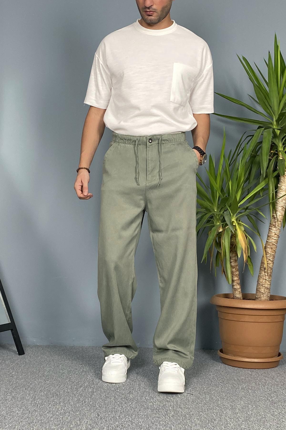  Beli ve Paçası Bağcıklı Haki Kot Pantolon